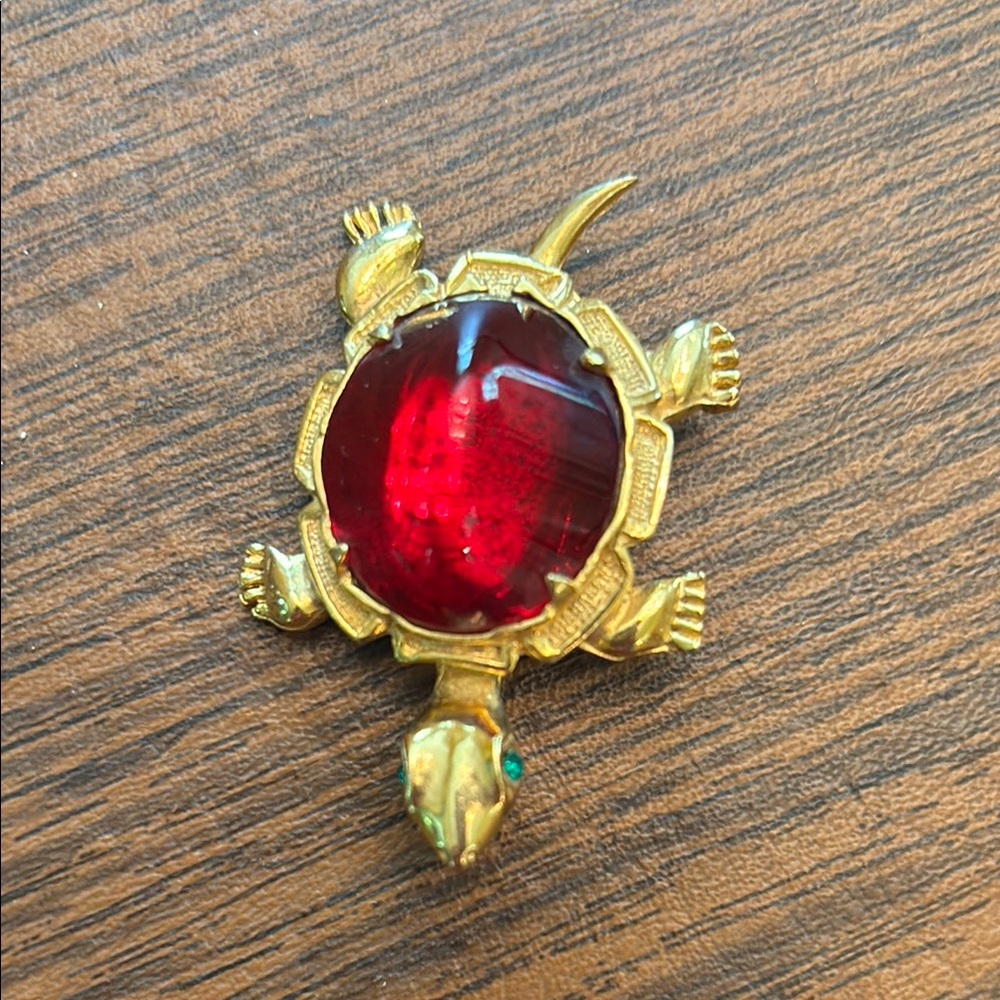 Elegant Gold Turtle Brooch with Red Gem